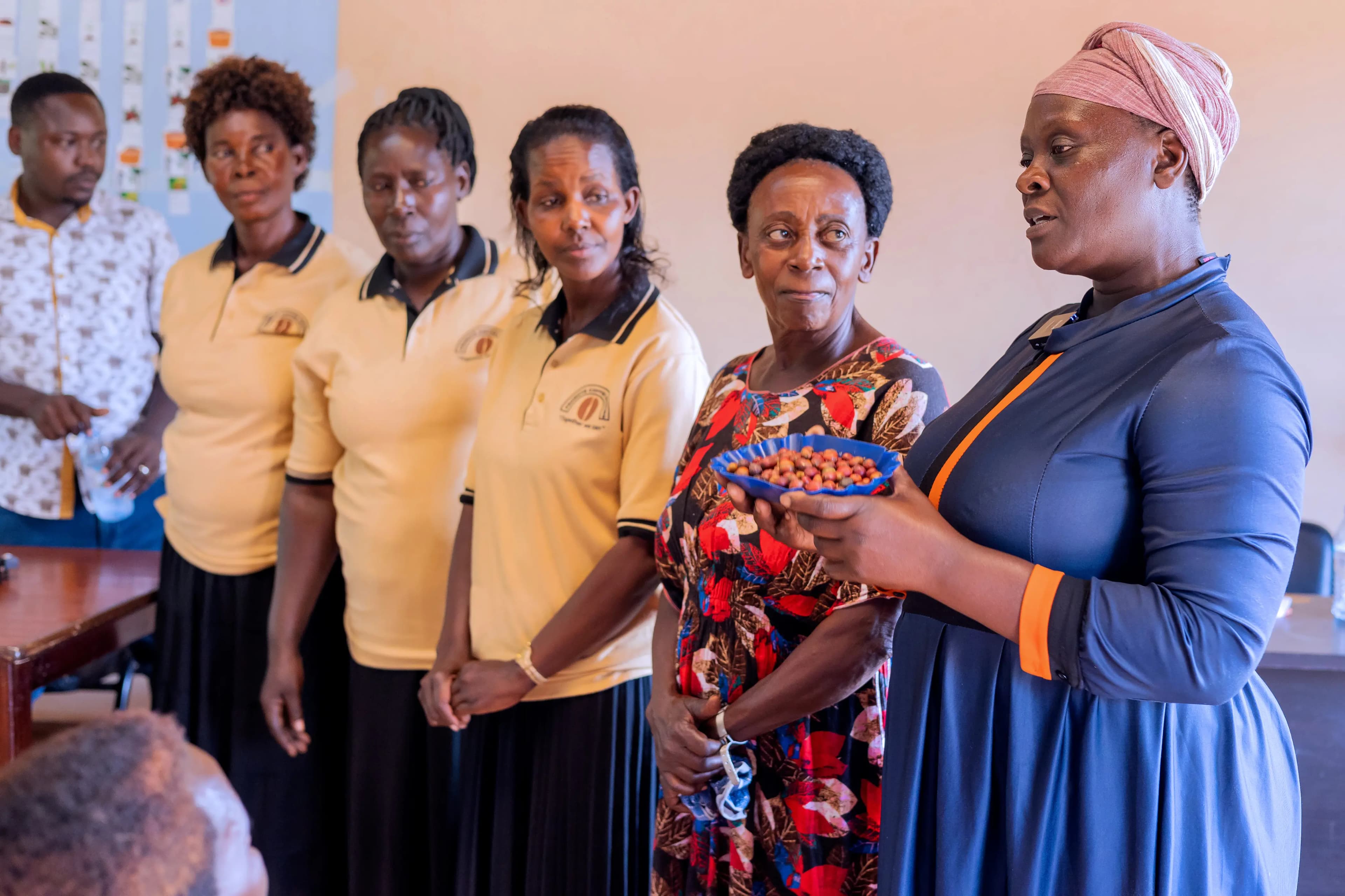 Women coffee farmers in misty forest